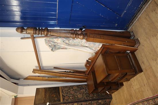 An oak four poster bed and a pair of bedside cabinets W.164cm and 46cm